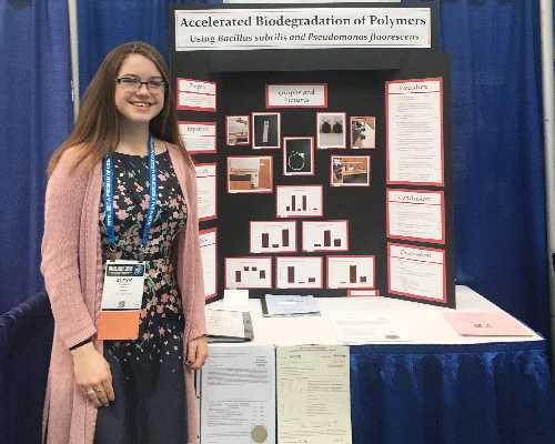 Warwick student presents science fair project.