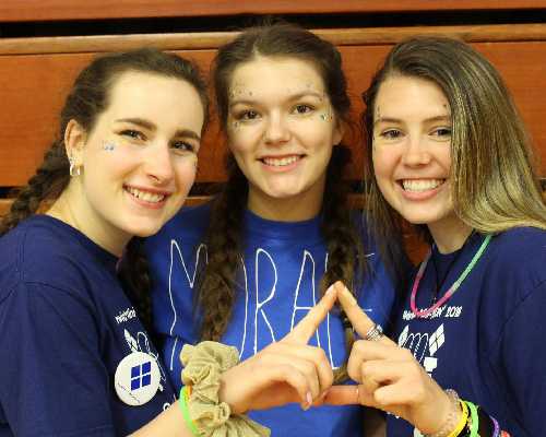 warwick high school female students pose for photo.