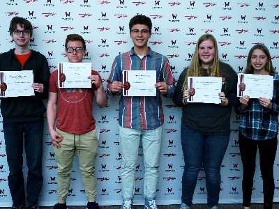 Material science fair winners pose for photo.