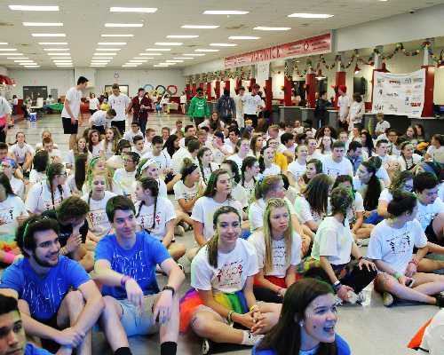 high school students sit on floor for minithon event.